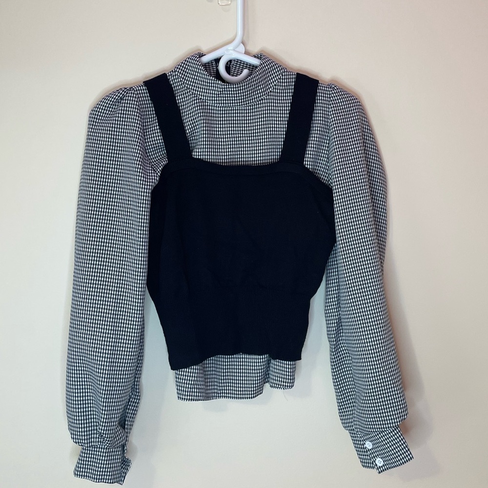 blouse and black tank top